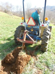 Bill chisel plowing the planting rows